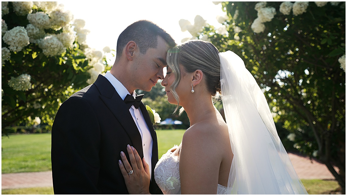 Bride and groom looking into each others eyes at Old Westbury Golf Country Club