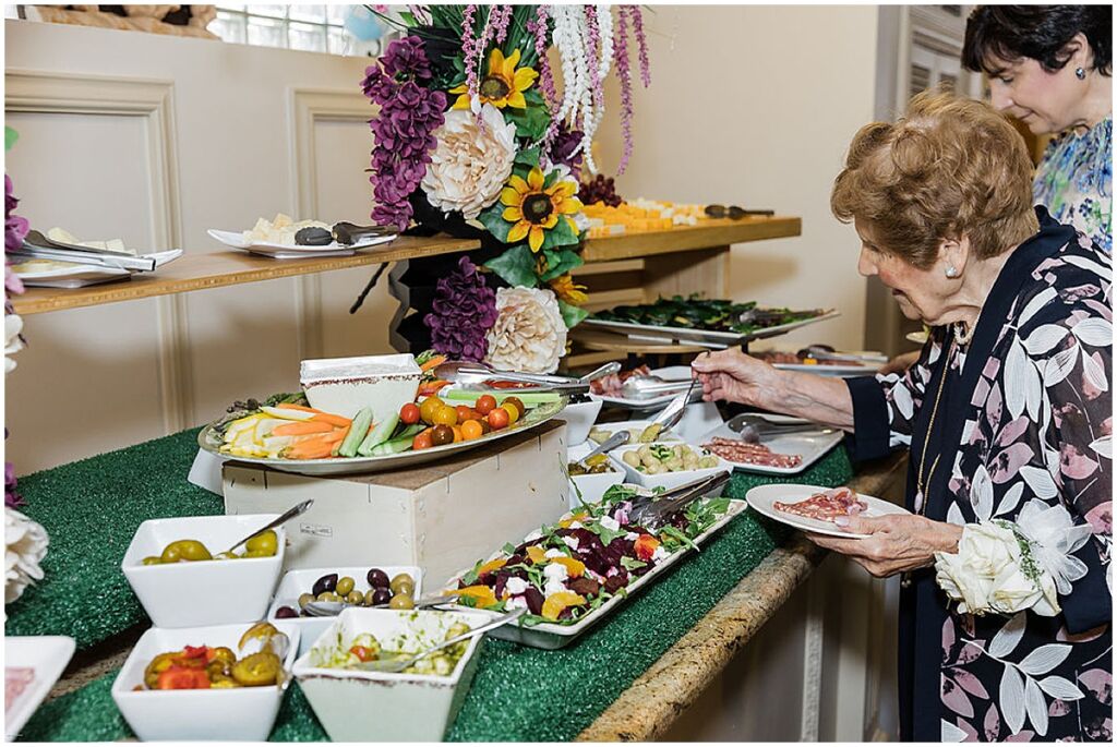 Guest helping herself to apps at Soundview Caterers wedding